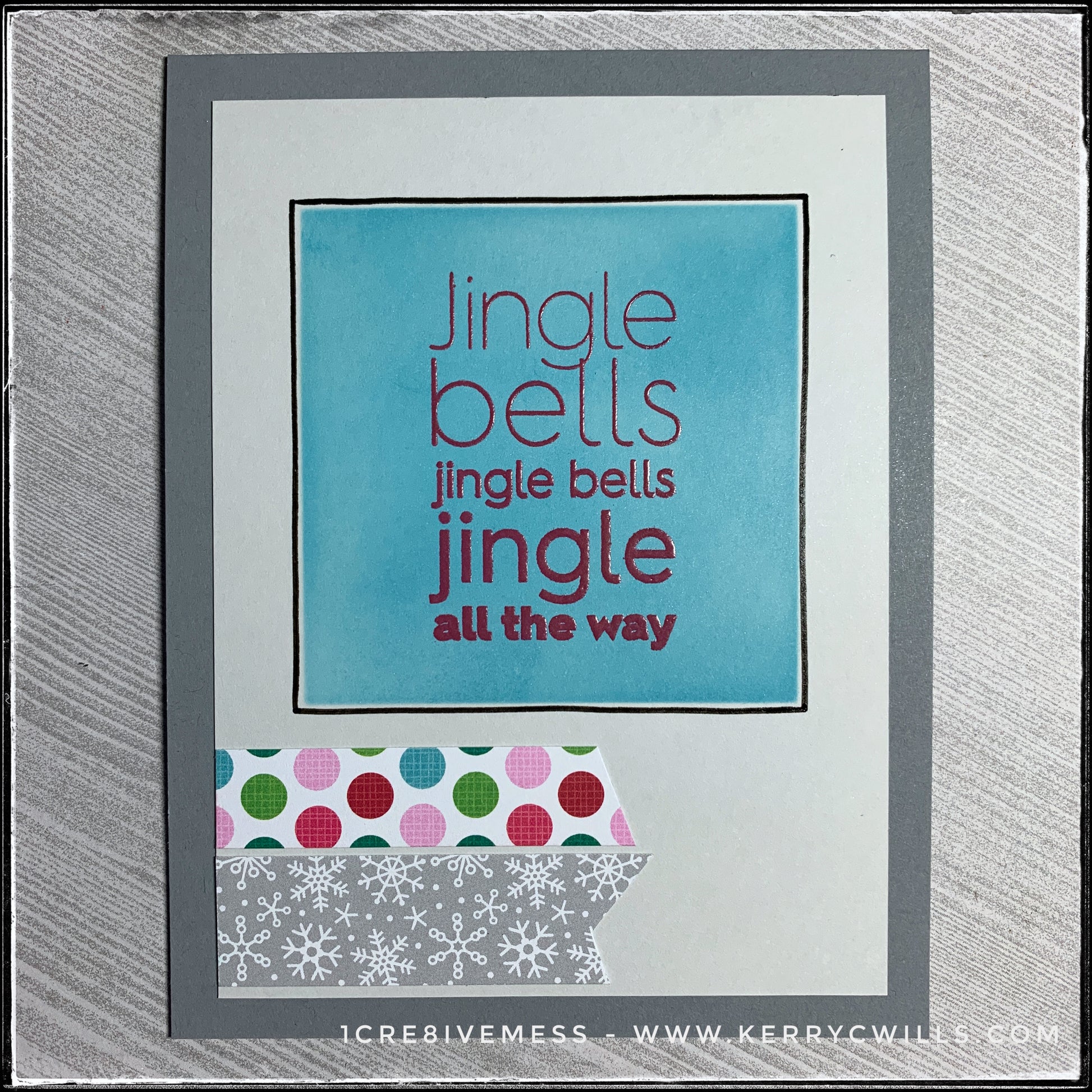 "Jingle bells jingle bells jingle all the way" is the sentiment on this clean and simple card. Two different patterns form two tiny banners near the bottom left corner of the card front. Hand drawn lines add a nice texture, as does the clear embossing of the sentiment. This card is wonderful for any and every winter holiday!