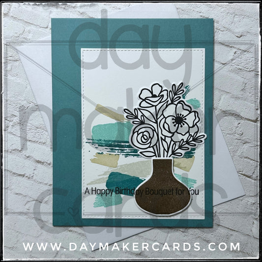 Handmade greeting card with floral design and 'A Happy Birthday Bouquet for You' text, featuring stamped and die-cut images.
