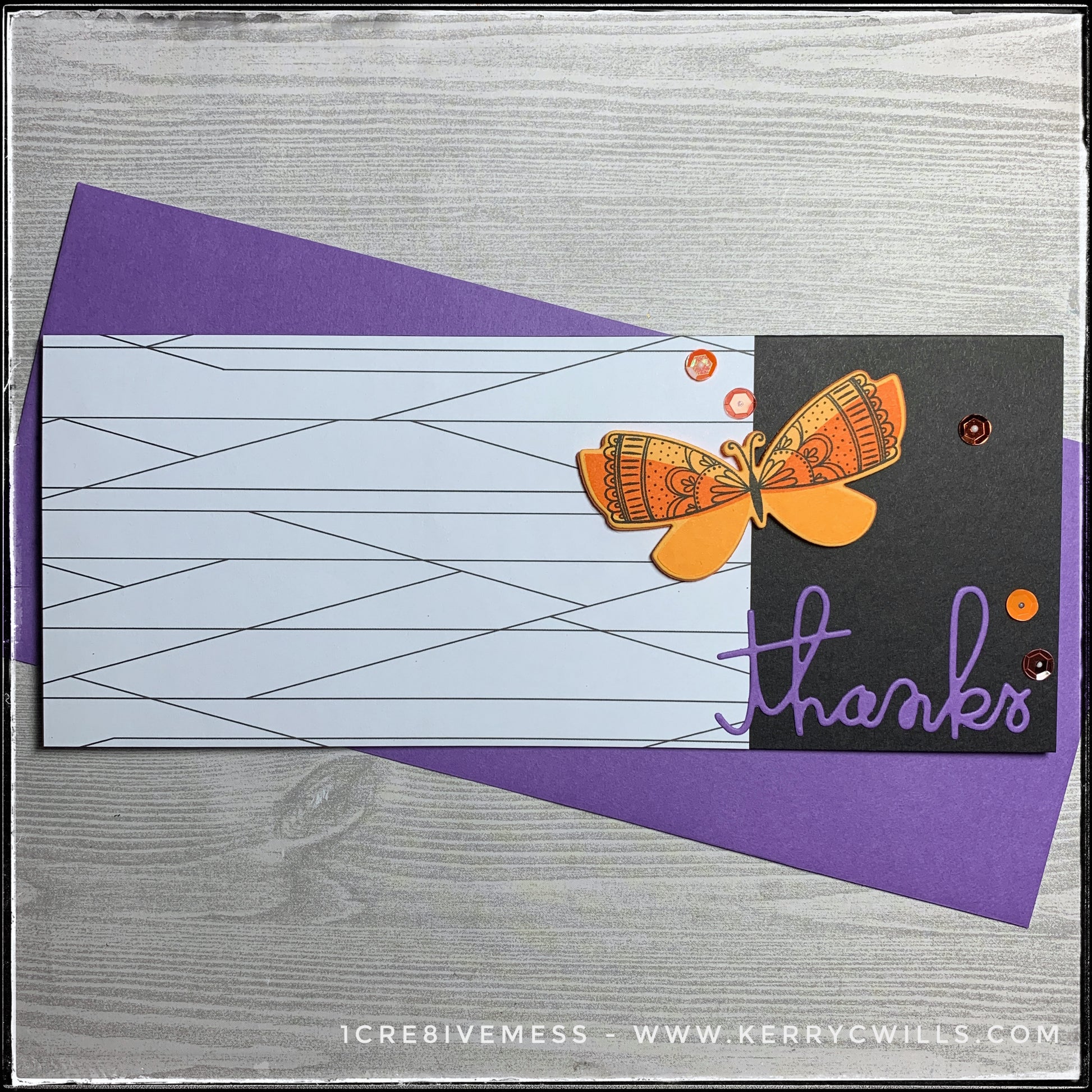 A handmade slimline card with a white and black lined patterned section, directly next to the die-cut word "thanks" and a dimensional butterfly. A smattering of orange sequins add detail to the right side of the card. A purple envelope is included. 