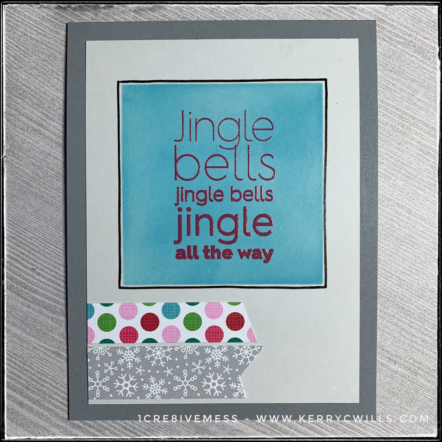 "Jingle bells jingle bells jingle all the way" is the sentiment on this clean and simple card. Two different patterns form two tiny banners near the bottom left corner of the card front. Hand drawn lines add a nice texture, as does the clear embossing of the sentiment. This card is wonderful for any and every winter holiday!