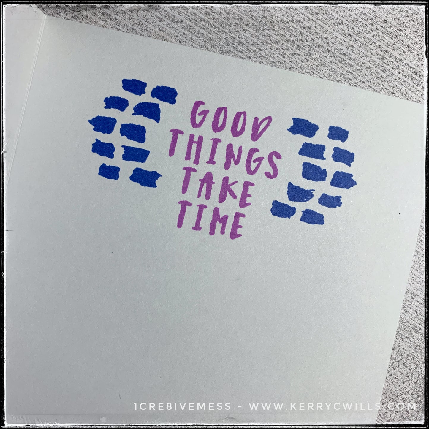 The inside of this handmade card has a secondary sentiment which coordinates with the front of the card. "Good things take time" is stamped in purple ink near the top middle of the card and on either side are the same small blue dashed lines as on the front of the card. 